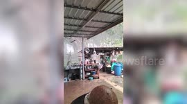 Monsoon storm batters resident's patio in northern Thailand
