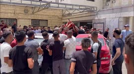 Mourners attend the funeral of Palestinian Mohammed Abd al-Hakim Nada who was killed in an Israeli raid in the West Bank