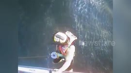 Coast Guard Rescues 2 From Capsized Boat 4 Miles East of Jekyll Island, GA, USA