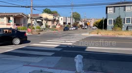 Insane moment police car gets rammed by allegedly stolen van, causing chaos in Oakland, California