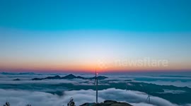 Stunning sea of clouds flow among mountains in China