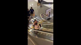 Distracted Person Doesn't Realize Escalator Is Stopped