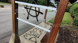(President) Macron beheading (in french: Macron décapitation) and antifa symbols appear in the peaceful town of Saint-Nom-la-Bretèche in Paris suburb, France. 30 july 2023