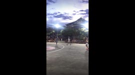 Basketball Player Accidently Runs Into Referee