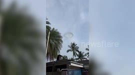 Huge black ring floats in sky at grilled food festival in Singapore