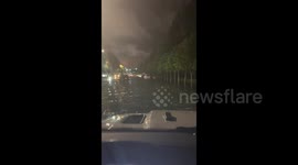 Cars Driving Through the Water as Floods Covering the Road in Linyi, Shandong, China