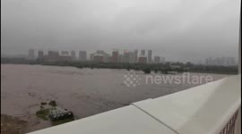 Remnants of Typhoon Doksuri prompts record-high rain level alerts in Beijing