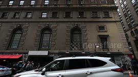 Migrants Wait Outside Midtown Hotel Seeking Temporary Housing In New York, USA