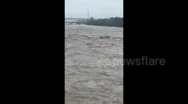 Typhoon Doksuri: Vehicles swept away by river as bridge collapses in Beijing