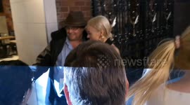 Lily Allen greets fans after performance at Duke of York's Theatre
