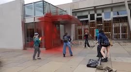 UK: Climate Activists Throw Red Paint At Scottish Parliament Over Oil And Gas Licenses