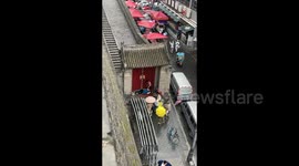 Chinese tourists caught dismantling gate to avoid entry fee