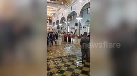 Bride walks through flooded church amid typhoon aftermath in the Philippines (third angle)