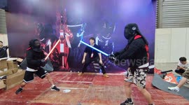 Players Experience Star Wars Laser Sword at ChinaJoy2023 in Shanghai, China