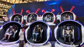 Players Experience Digital Space Capsule Roaming at ChinaJoy2023 in Shanghai, China