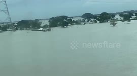 Houses submerged in Typhoon Khanun flood aftermath in the Philippines