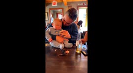 'His 1st time trying it!' - Baby boy receives a sour surprise after biting into a lime