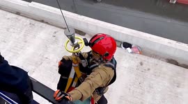 Helicopter used to rescue residents trapped on flooded building roof in China