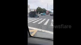 A Tricycle Carrying a Heavy Load Was lifted up in the Front in Suzhou, Jiangsu, China