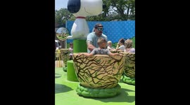 Dad Spins Teacup Ride Into Overdrive