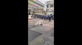 Joy amidst the rain: a child's playful adventure at Quiapo church