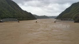 Bridge collapses during floods from typhoon in the Philippines