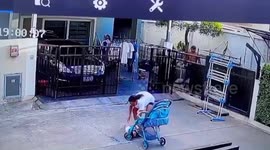 Quick-thinking mother saves baby girl when she topples out of pushchair