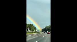 Enchanting double rainbow delights travelers in Rakov, Belarus