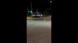 Midnight motorbike melody: barking serenade by excited street dogs