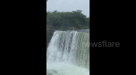 A Man Made a Dive from a Waterfall in Mudanjiang, Heilongjiang, China