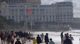 Locals on France's west coast gather to watch huge waves crash against coast