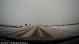 Dashcam records a close call with a reckless driver that lost control on an icy road!