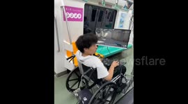 A Wheelchair Enabling the User to play Computer Game CS:GO right on subway in Shaanxi, China