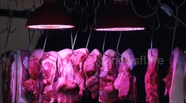 Fresh Lights Mislead Pork Consumers in Yichang, China