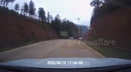 Reckless white SUV causes collision with street light: violation of traffic rules in Jiangxi Province, China
