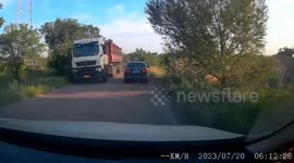 Friend's car narrowly avoids major collision with large truck on rural road in Heilongjiang Province