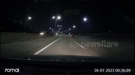 Sign Slips From Truckbed