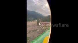 Balkan resort town with 11 dead and dozens missing after landslides in Georgia