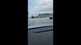 Flood waters in Scarborough covering the coastal road, typical British weather