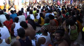 Cracking faith! Coconuts smashed over devotees heads during Indian ritual