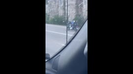 Motorcycle Rider Reclines Comfortably on the Highway