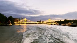 A View Of A Eastbound High Speed Boat Cruising The River Thames