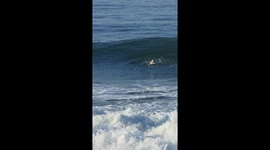 Body Surfer Spins in Wave