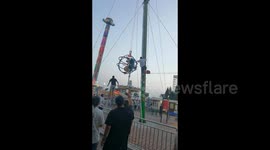Passengers left dangling in mid-air as reverse bungee ride snaps at Chinese amusement park