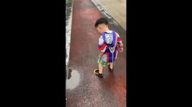Rainy day joy: a hilarious puddle jump gone wrong!
