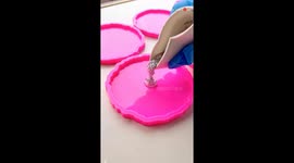 Resin Artist makes amazing white-colored flower-like coasters with mold and resin