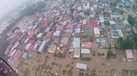 Helicopter crew rescues residents trapped in floods in N China