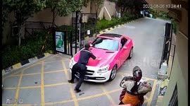 Security guard carried a kilometre on Mercedes bonnet in China after heated parking dispute