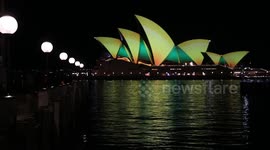 Sydney Opera House lit up in green and gold for Matildas, Sydney, Australia