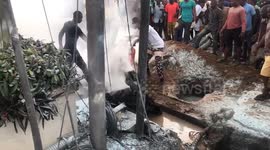 Locals extinguish plane crash fire in Lagos, Nigeria